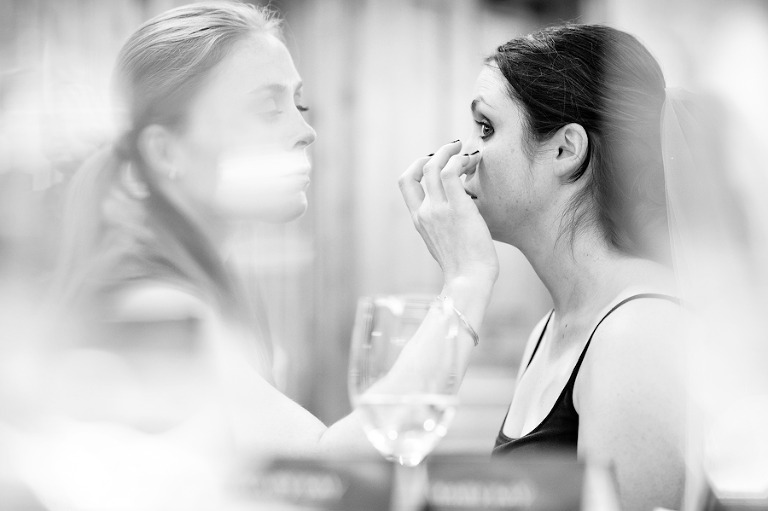 Bride having her makeup done before a fall wedding at the Arrabelle in Vail Colorado.