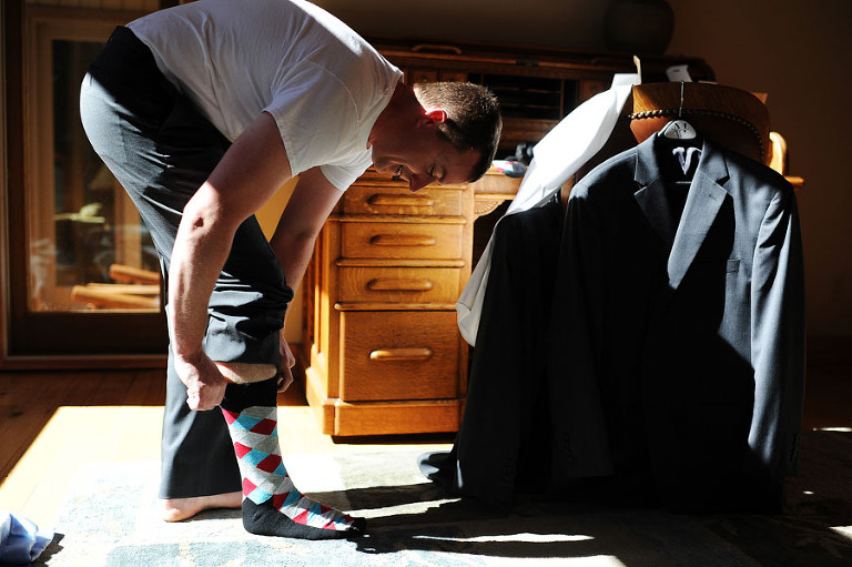 Groom getting ready for a wedding at Larkspur Restaurant in Vail, Colorado. - True North Photography Kira Vos (Horvath)