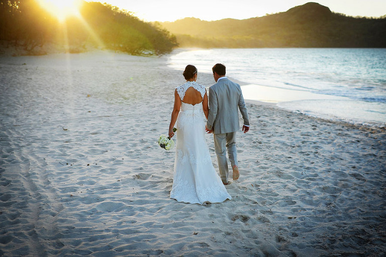 Portraits of the bride and groom after their Costa Rica beach wedding at Reserva Conchal. - True North Photography